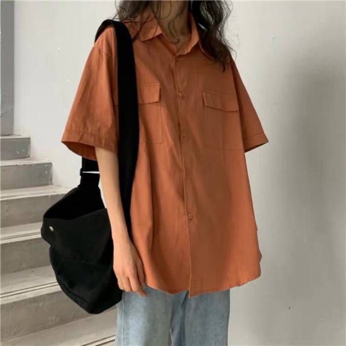 Mẫu áo sơ mi nữ form rộng màu cam trẻ trung